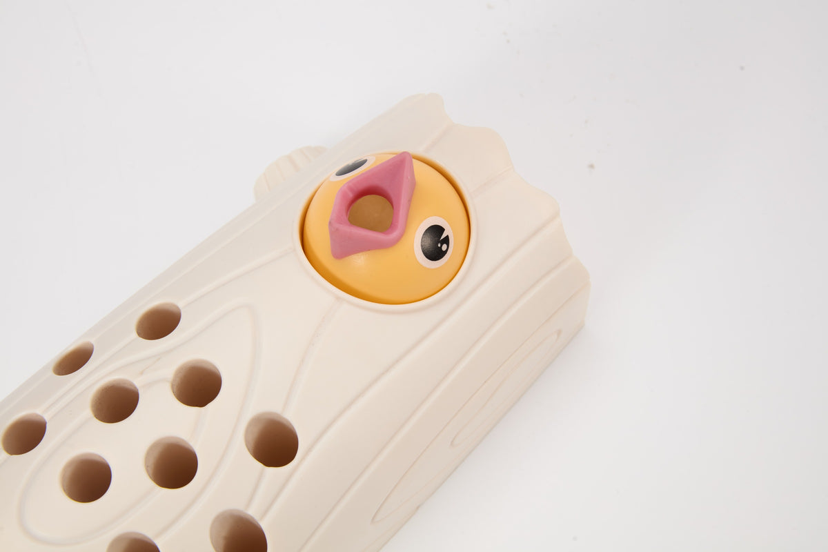 Little Woodpecker Soft Pink — baby bird and worm holes in close-up