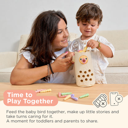 Nene Toys Little Woodpecker Soft Pink — parent and child playing together
